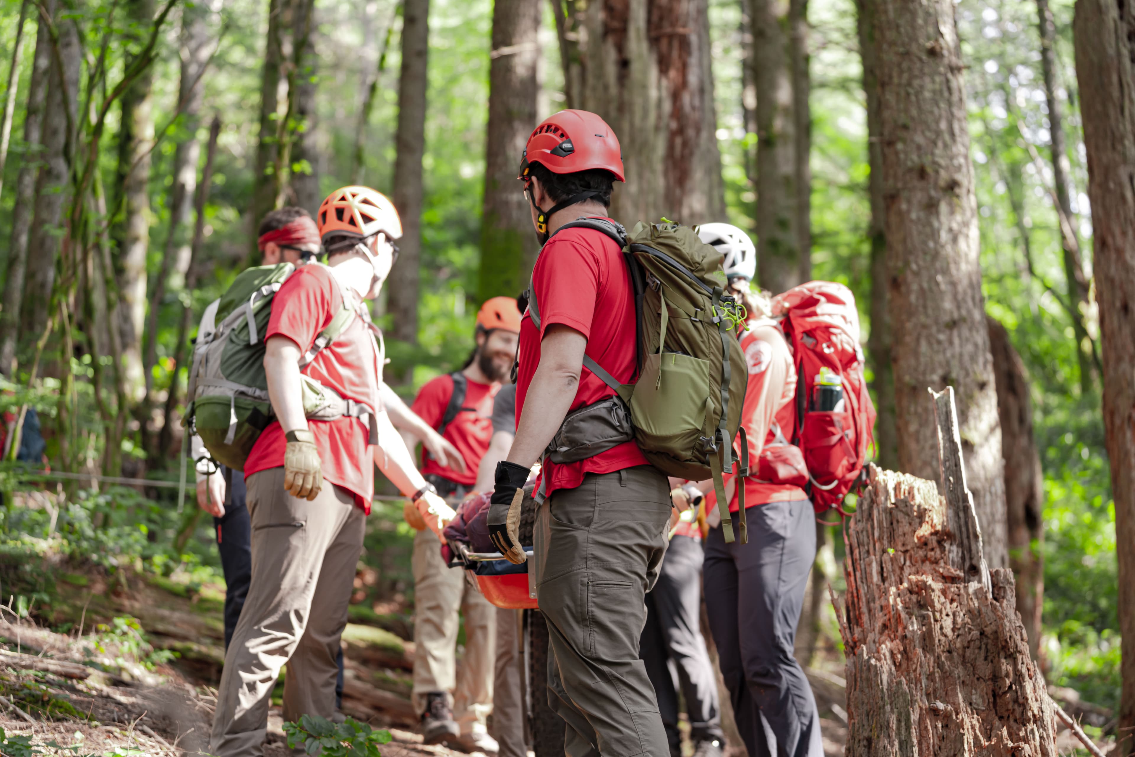 Rescuers evacuating a subject