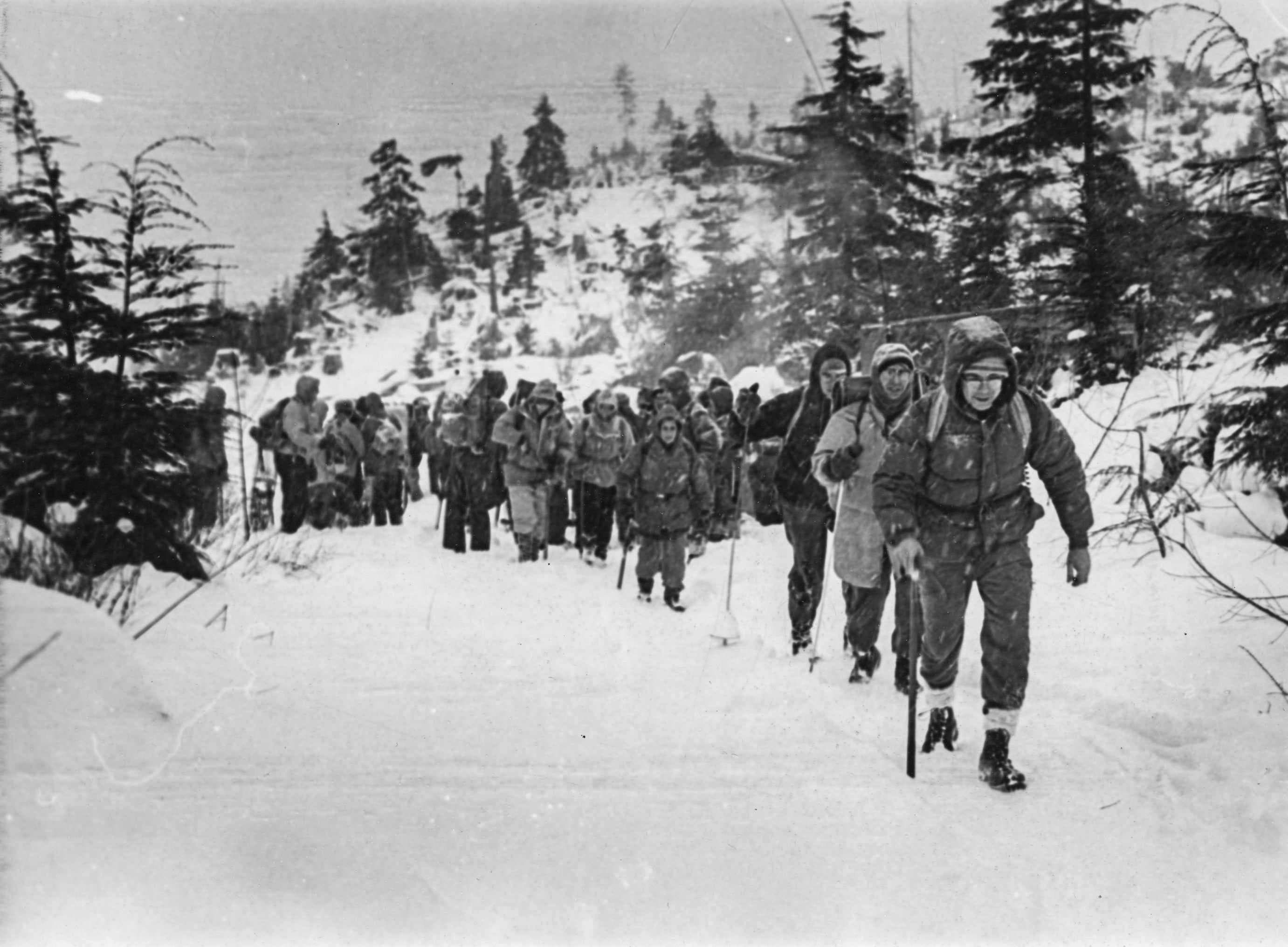 Rescuers walking in the snow